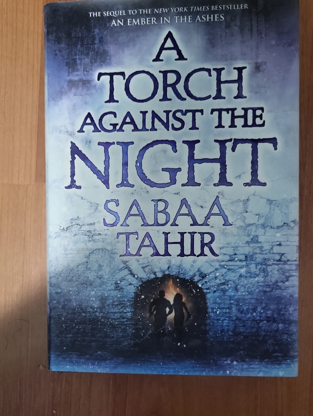 A Torch Against The Night by Sabaa Tahir - Blue Cover